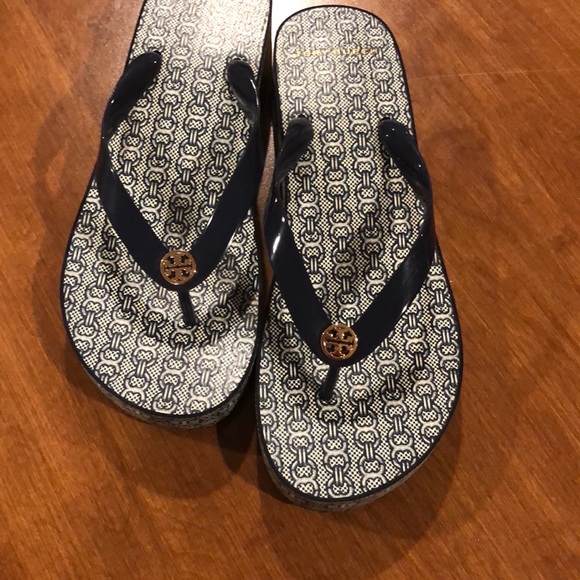 Tory Burch flip flops approximately 10 inches long.